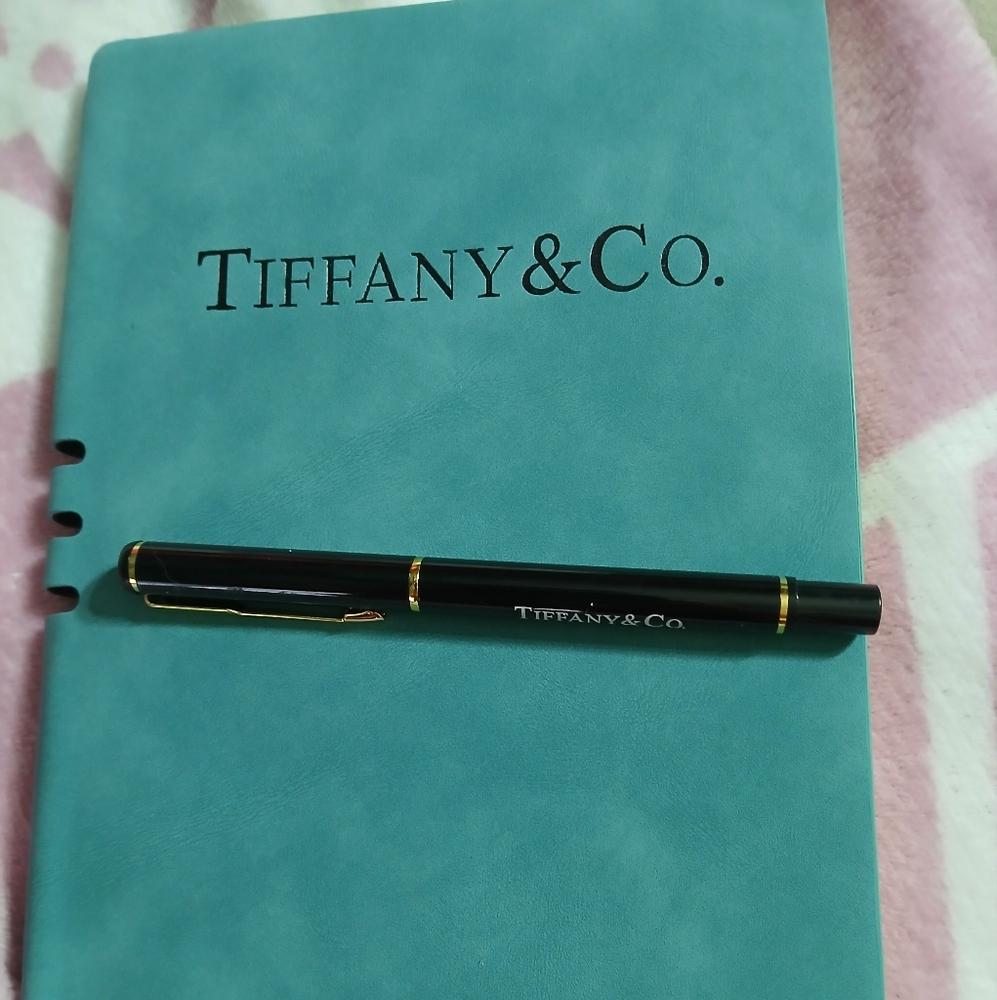 Brand New Tiffany & Co. Blue Notebook with Black and Gold Pen.